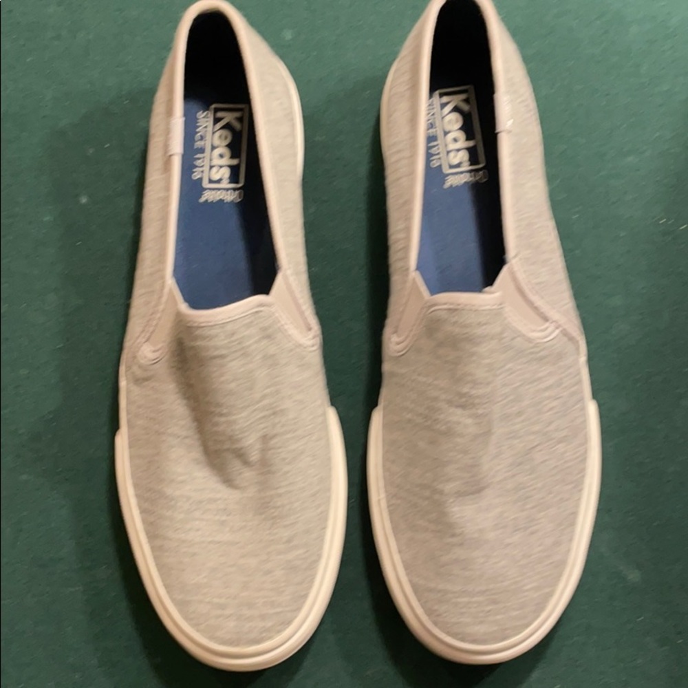 NWOT Keds Slip Ons in grey, women’s size 9.5